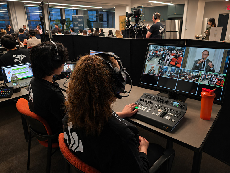 DAV Production crew operating a multi-camera hybrid conference from the production station