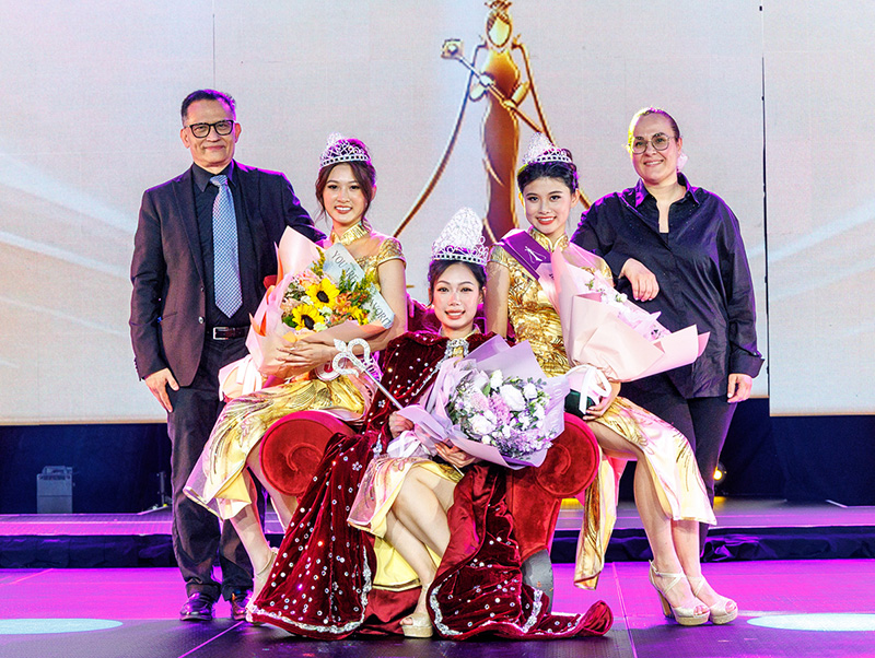 Three crowned Miss Chinese Beauty Pageant winners posing with DAV Production producers