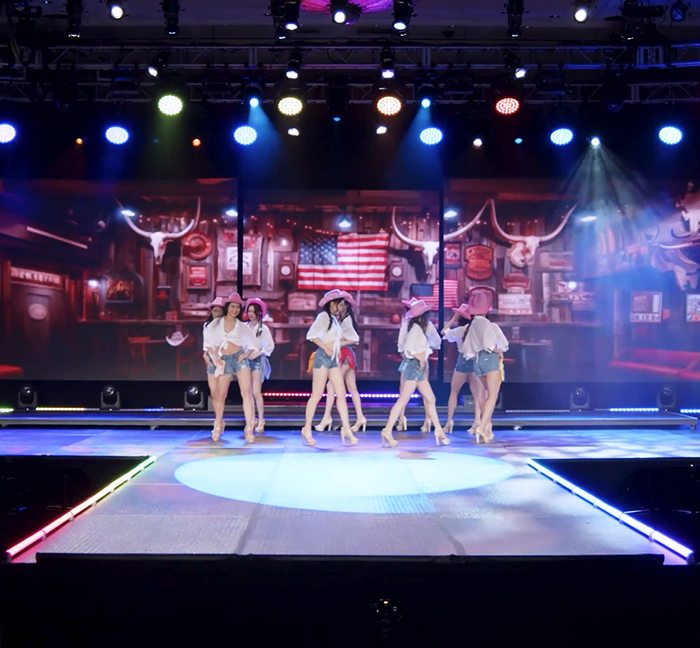 Contestants performing a Western-themed dance at the 2024 Miss Chinese Beauty Pageant