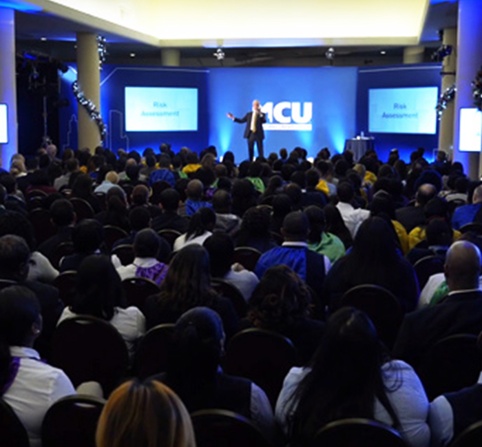 Presenter addressing employees during a Municipal Credit Union town hall