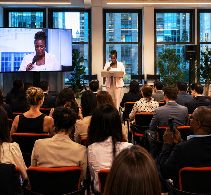 Speaker addressing the audience during the 2026 TECONY GCTF Seminar in New York
